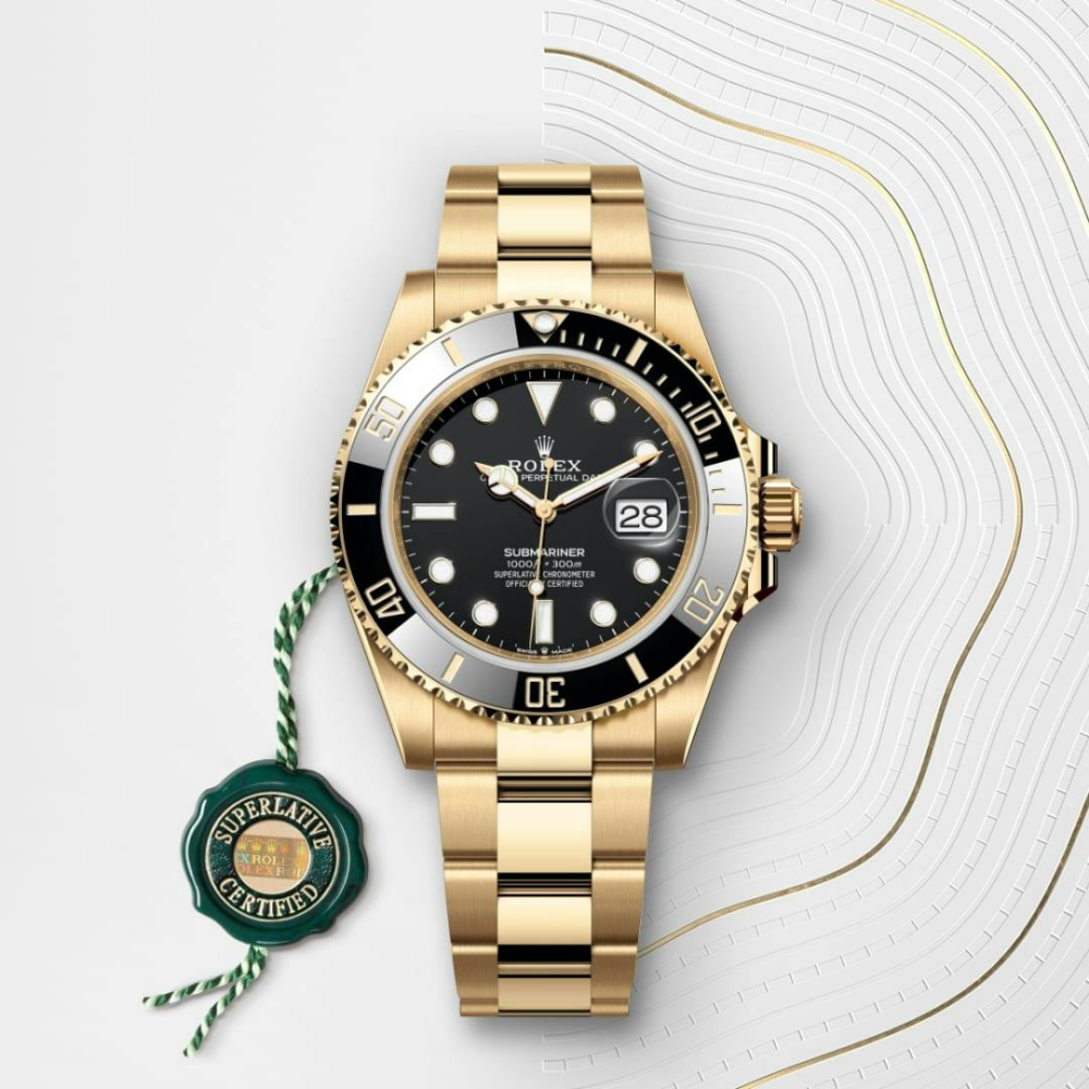 A- Submariner Date, 18k Yellow Gold, 41mm