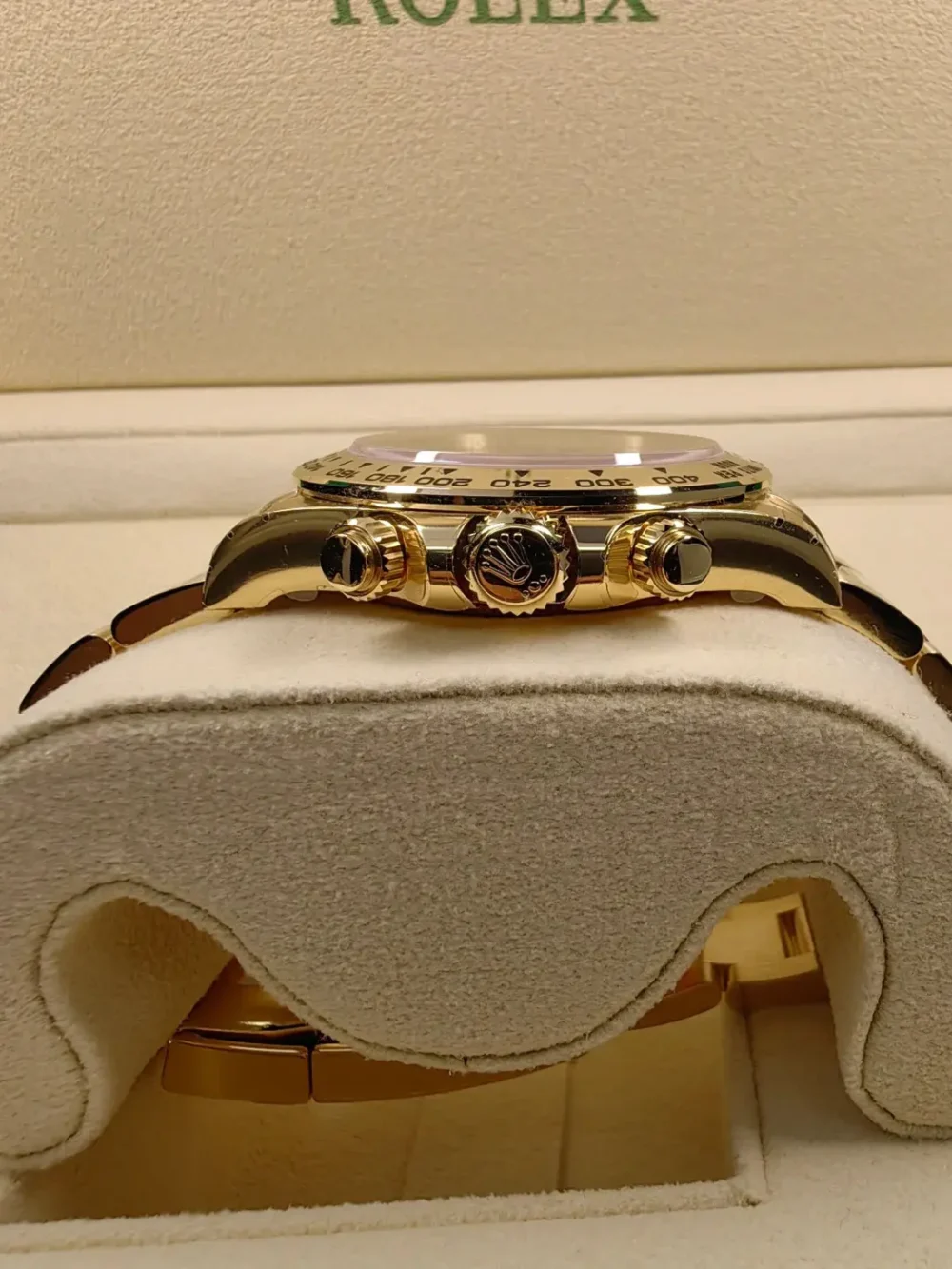 B – Rolex Cosmograph Daytona Yellow Gold Paul Newman Dial